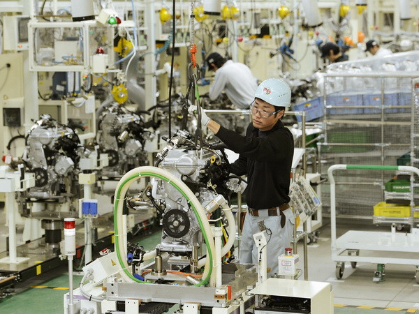 Chính phủ Nhật Bản hối thúc doanh nghiệp trong nước tăng lương ảnh 1