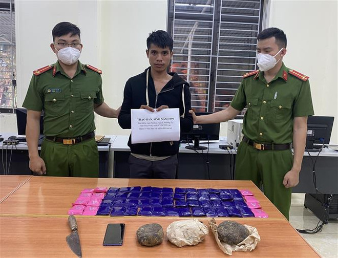 Bắt đối tượng mua bán gần 2kg thuốc phiện, 12.000 viên ma túy tổng hợp ảnh 1