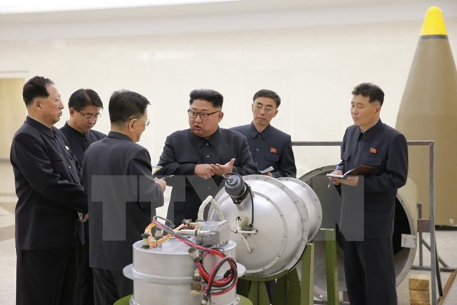 Mở đại tiệc, ông Kim Jong-un tuyên bố đẩy mạnh răn đe hạt nhân ảnh 1