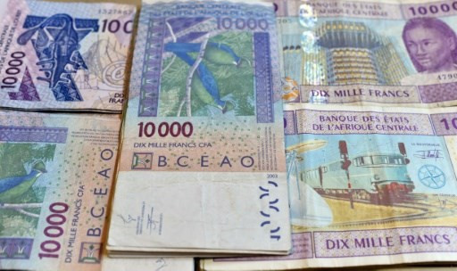 Đồng franc CFA Tây Phi. (Nguồn: AFP) Vấn đề nợ của châu Phi: Không phải vay quá nhiều mà lãi suất quá cao ảnh 1
