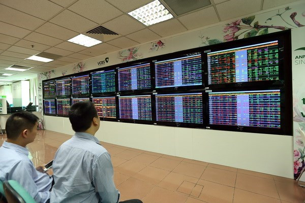 Ảnh minh họa. (Nguồn: TTXVN) VN-Index tăng mạnh gần 22 điểm và tiếp tục xác lập mốc lịch sử ảnh 1