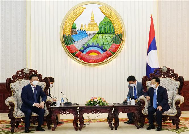 Lãnh đạo Lào đánh giá cao sự hợp tác chặt chẽ giữa Hà Nội và Vientiane ảnh 2
