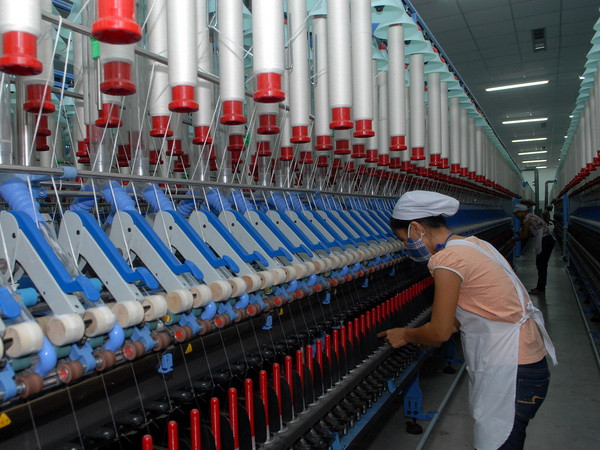 Nam Định: Nhiều doanh nghiệp dệt may đã đủ đơn hàng năm 2015 ảnh 1