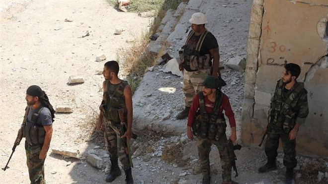 SOHR: Lực lượng nổi dậy Syria rút khỏi các vùng trọng yếu ảnh 1