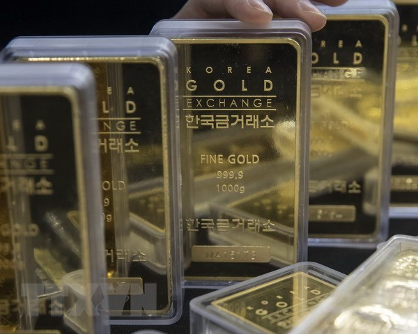 Giá vàng tại châu Á rơi xuống mức thấp nhất trong sáu tháng ảnh 1