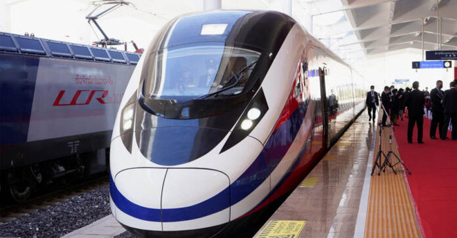 Tàu khách quốc tế Lào-Trung Quốc. (Nguồn: Bangkok Post) Chuyến tàu khách quốc tế Lào-Trung Quốc khởi hành chuyến đầu tiên ảnh 1