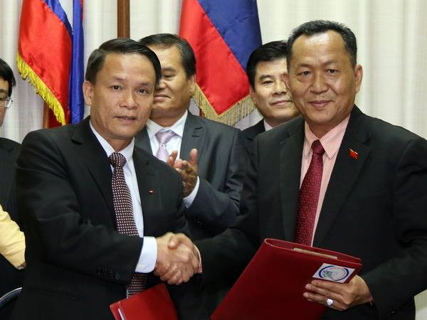 TTXVN-KPL ký thỏa thuận hợp tác nghiệp vụ giai đoạn 2016-2020 ảnh 1