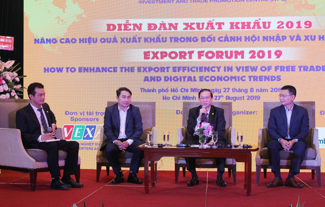 Các chuyên gia chia sẻ thông tin tại Diễn đàn. (Ảnh: Xuân Anh/TTXVN) Tận dụng lợi thế từ hội nhập và kinh tế số để đẩy mạnh xuất khẩu ảnh 1