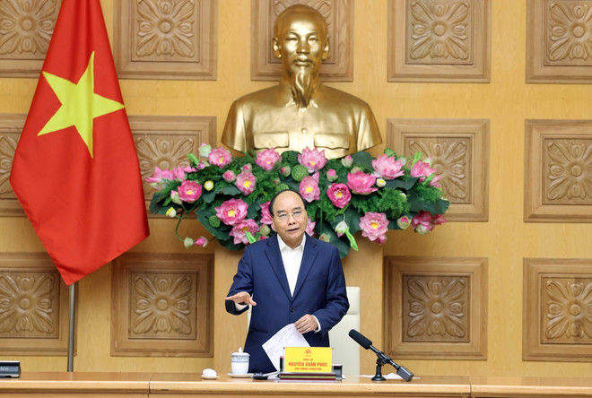 Thủ tướng Chính phủ làm việc với đại diện ngành dệt may, da giày ảnh 1