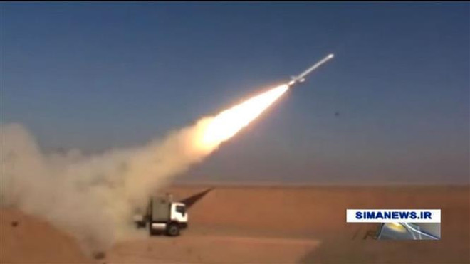 Một vụ thử tên lửa hành trình của Iran. (Ảnh: AFP/TTXVN) Iran khẳng định không có ý định sản xuất hoặc sử dụng vũ khí hạt nhân ảnh 1