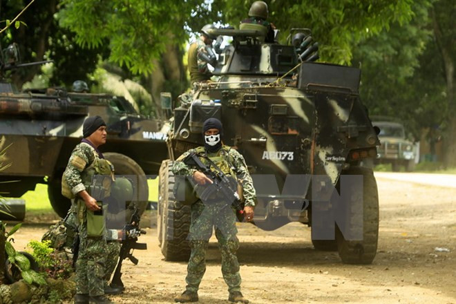 Binh sỹ Philippines trong chiến dịch truy quét phiến quân Abu Sayyaf tại Jolo, tỉnh Sulu, Mindanao. (Nguồn: AFP/TTXVN) Philippines, Iran tiêu diệt các tay súng cực đoan có liên quan tới IS ảnh 1
