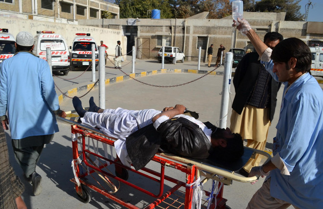 Đấu súng và đánh bom tại Pakistan gây thương vong lớn ảnh 1