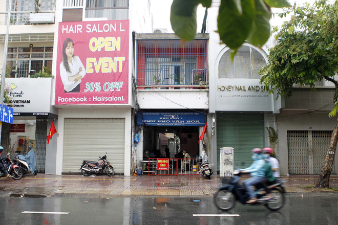 [Photo] TP.HCM phong tỏa khu vực có ca mắc COVID-19 mới ở Quận 3 ảnh 3