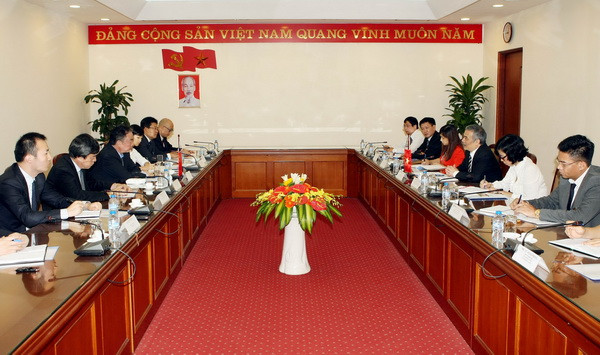 Tăng cường hợp tác giữa Thông tấn xã Việt Nam và Tân Hoa xã ảnh 1