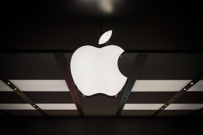(Ảnh minh họa: AFP/TTXVN) Apple nộp phạt 12 triệu USD dàn xếp vụ kiện chống độc quyền ở Nga ảnh 1