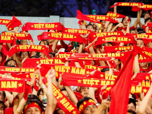 Người hâm mộ cũng đã từng dành tình yêu cho U23 Việt Nam như thế này. (Ảnh: Minh Chiến/Vietnam+) Nhìn từ U19: Chúng ta đã "cướp" của U23 sự công bằng? ảnh 2