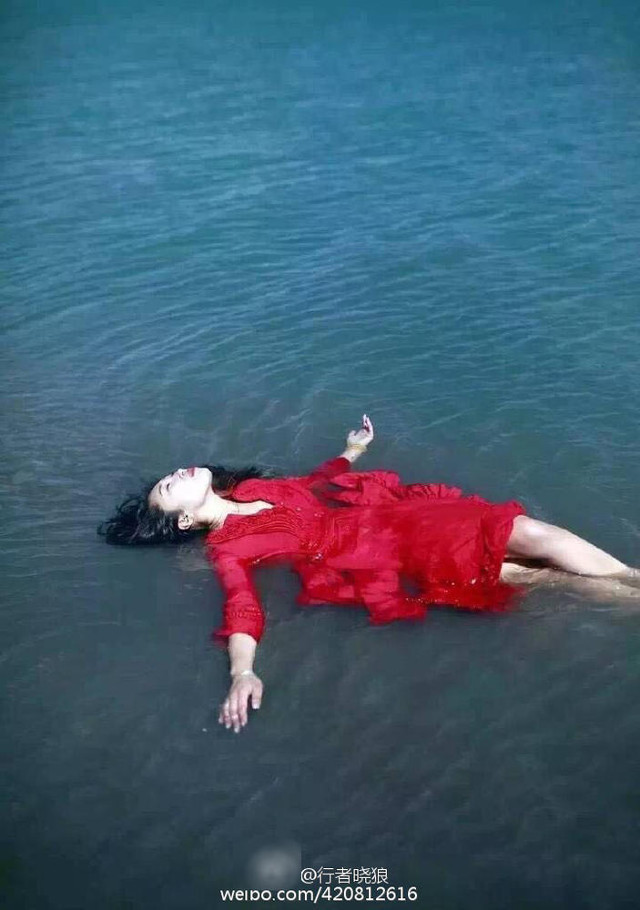 Cư dân mạng phẫn nộ với bộ ảnh cô gái khỏa thân bên hồ thiêng ảnh 4