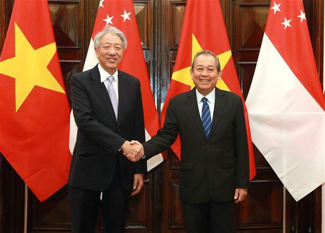 Quang cảnh cuộc gặp. (Ảnh: Doãn Tấn/TTXVN) Thúc đẩy quan hệ đối tác chiến lược Việt Nam-Singapore ảnh 1