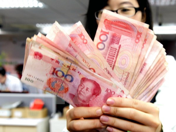 Kiểm đồng Nhân dân tệ. (Nguồn: EPA/TTXVN) Trung Quốc mở rộng rổ tiền tệ để tính tỷ giá đồng nhân dân tệ ảnh 1