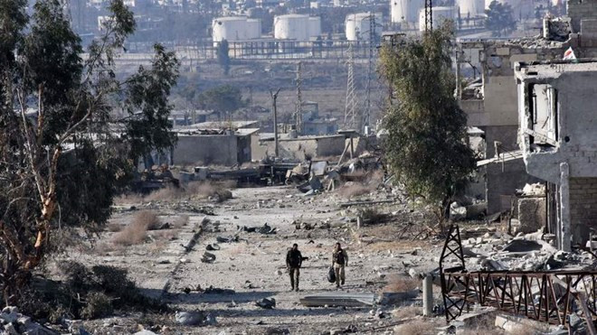 Hình ảnh tan hoang tại Syria. (Nguồn: AFP/Getty Images) Lệnh ngừng bắn trên toàn lãnh thổ Syria chính thức có hiệu lực ảnh 1