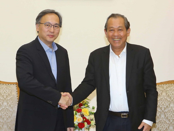 Phó Thủ tướng tiếp Thứ trưởng Thường trực Bộ Nội vụ Singapore ảnh 1