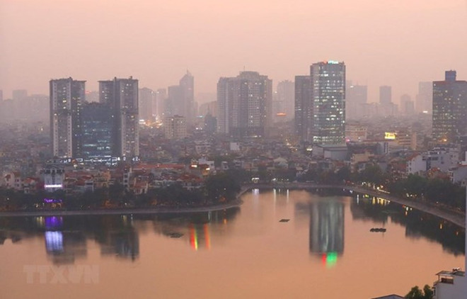 Chỉ số chất lượng không khí tại Hà Nội có những thời điểm lên tưới ngưỡng rất xấu. (Ảnh minh họa. Nguồn: TTXVN) Phó Thủ tướng ''chốt'' 8 nhiệm vụ cho ngành tài nguyên và môi trường ảnh 2