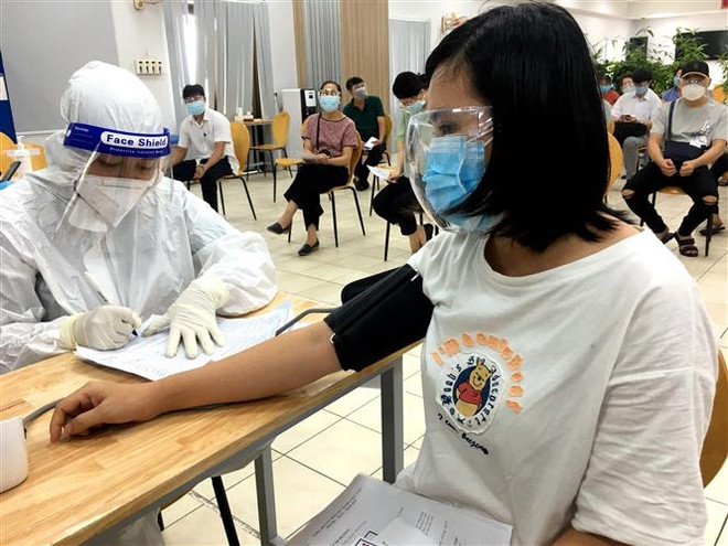 Đề nghị TP.HCM, Long An, Đồng Nai, Bình Dương tăng tốc tiêm vaccine ảnh 1