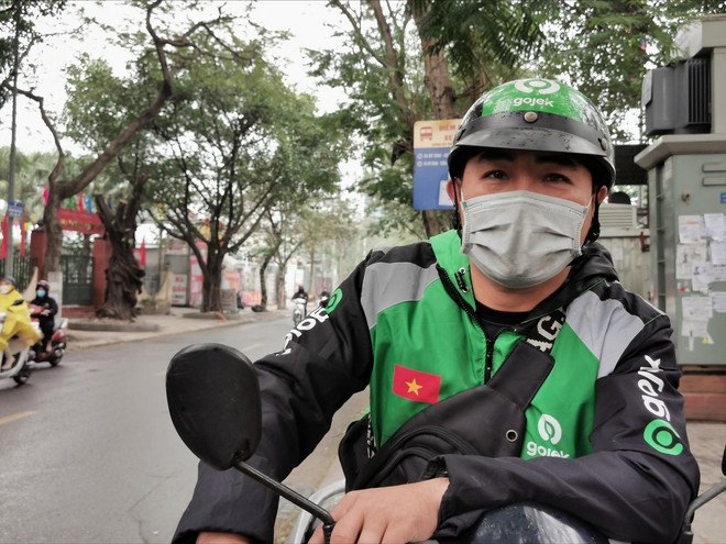 Những ngày cuối năm đặc biệt của những tài xế lái xe công nghệ ảnh 1