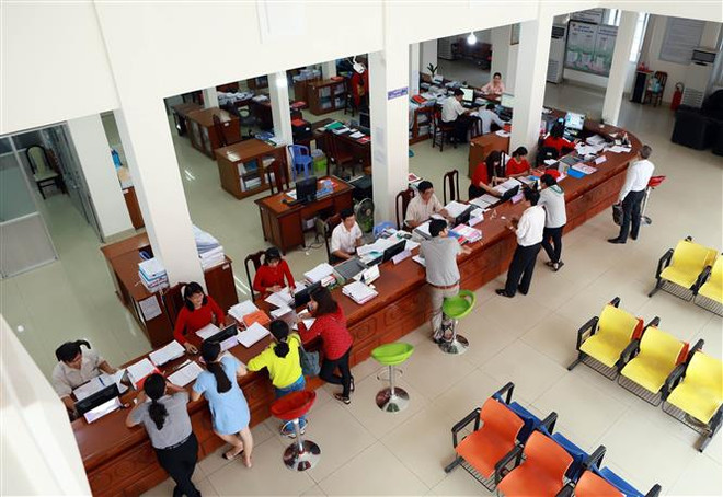 (Ảnh minh họa: Hoàng Hùng/TTXVN) 'Tinh giản biên chế là giảm bớt sự phụ thuộc vào ngân sách Nhà nước' ảnh 1