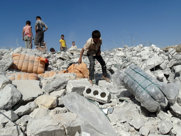 Mỹ và đồng minh cam kết tăng viện trợ cho phe đối lập Syria ảnh 1