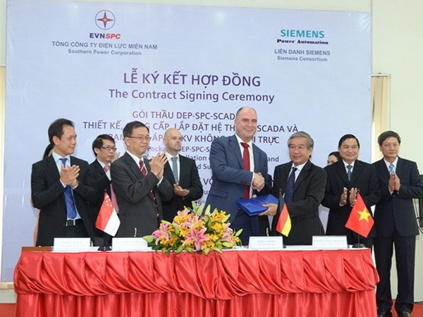Điện lực miền Nam và Liên danh Siemens ký kết hợp đồng hợp tác ảnh 1