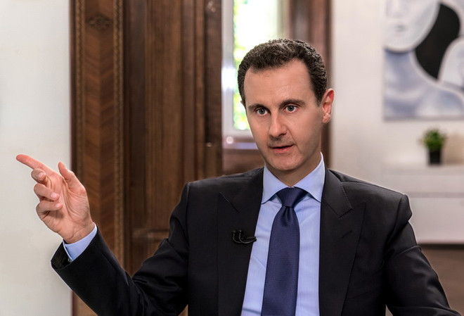 Tổng thống Syria Bashar al-Assad. (Ảnh: AFP/TTXVN) Bộ trưởng Israel cánh báo nếu Syria hợp tác quân sự với Iran ảnh 1