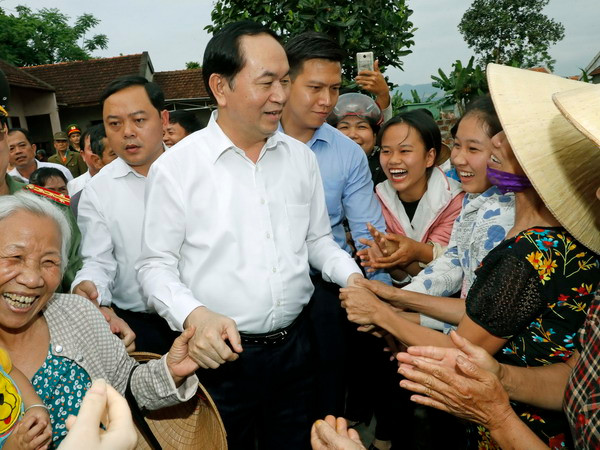 Chủ tịch nước Trần Đại Quang thăm xã nông thôn mới Nghĩa Đồng ảnh 1