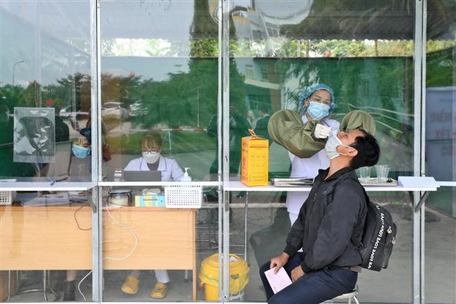 Việt Nam linh hoạt ứng phó, đạt nhiều thành công trong chống dịch ảnh 1