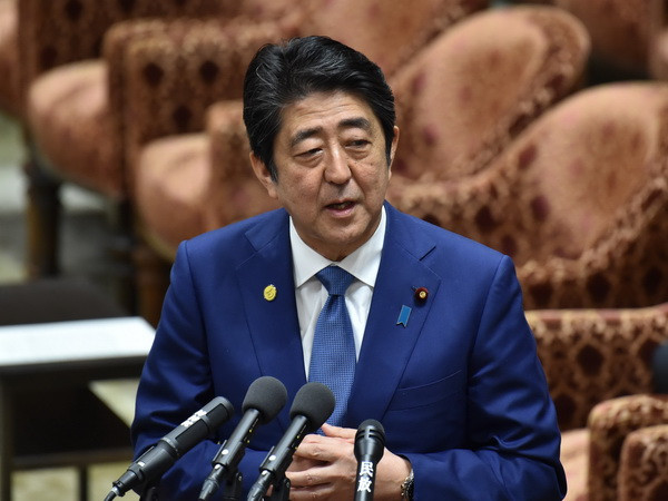 Tỷ lệ ủng hộ Thủ tướng Nhật Bản giảm sau thỏa thuận mua đất công ảnh 1
