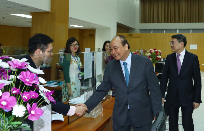 Thủ tướng dự giao ban đầu Xuân Kỷ Hợi tại Ngân hàng Chính sách xã hội ảnh 1