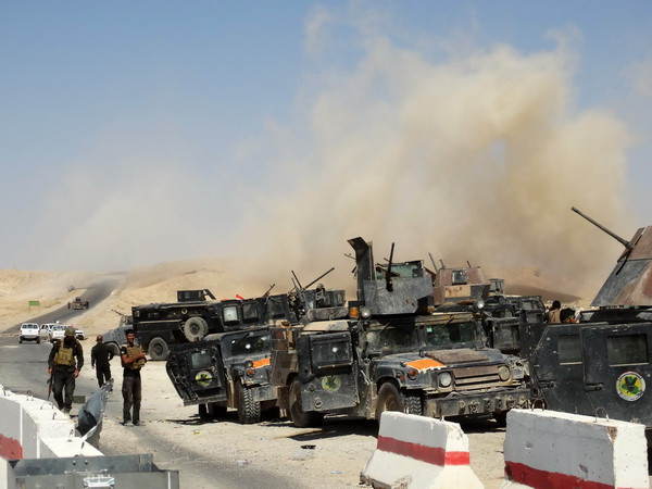 Ông John Kerry sang Trung Đông thảo luận cách thức đối phó với IS ảnh 1