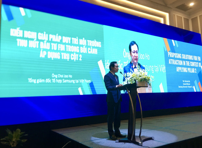 Các đại biểu đóng góp đề xuất tại Hội thảo. (Ảnh: PV/Vietnam+) Tìm cách giữ chân ‘đại bàng’ khi thuế tối thiểu toàn cầu được áp dụng ảnh 3