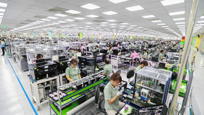 Ảnh minh họa. (Nguồn: PV/Vietnam+) Tìm cách giữ chân ‘đại bàng’ khi thuế tối thiểu toàn cầu được áp dụng ảnh 1