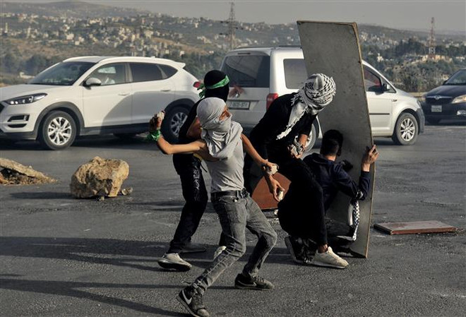 Lực lượng Israel đụng độ với người Palestine khiến 6 người thiệt mạng ảnh 1