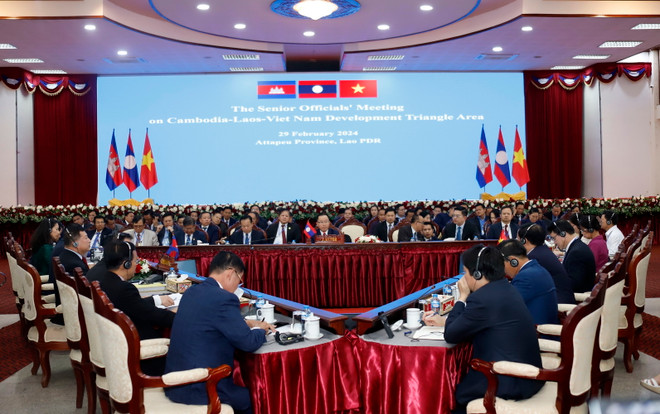 Quang cảnh Hội nghị. (Ảnh: Phạm Kiên/TTXVN) hoi nghi cap cao tam giac phat trien.jpg