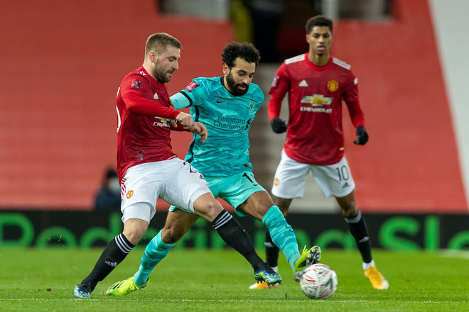 Manchester United so tài Liverpool. (Nguồn: AP) Xem trực tiếp 'kinh điển' Barca-Real, M.U-Liverpool trên kênh nào? ảnh 2