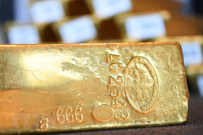 Giá vàng thế giới nhích lên trong bối cảnh đồng USD mất đà tăng ảnh 1