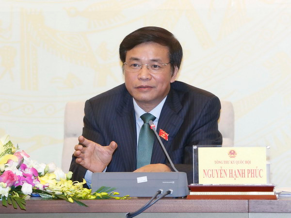 Ủy viên Ủy ban Thường vụ Quốc hội, Tổng Thư ký Quốc hội, Chủ nhiệm Văn phòng Quốc hội Nguyễn Hạnh Phúc phát biểu. (Ảnh: Doãn Tấn/TTXVN) Kỳ họp Quốc hội: Tranh luận sôi nổi, điều hành có nhiều đổi mới ảnh 1