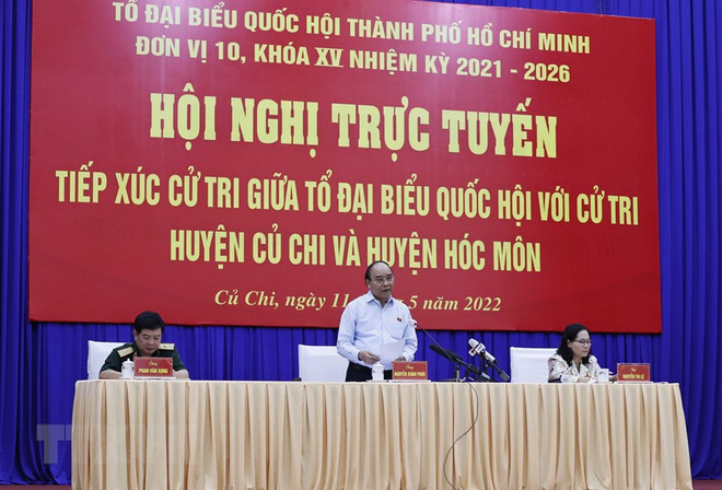 Chủ tịch nước Nguyễn Xuân Phúc phát biểu tại buổi tiếp xúc cử tri tại huyện Củ Chi (Thành phố Hồ Chí Minh), sáng 11/5. (Ảnh: Thống Nhất/TTXVN) Chủ tịch nước: TP.HCM cần tập trung giải quyết vấn đề bức xúc xã hội ảnh 1