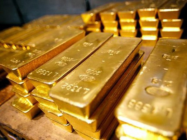 Giá vàng thị trường châu Á chạm mức cao nhất một tháng qua ảnh 1