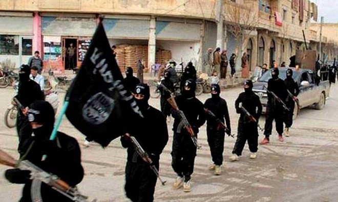 Syria: Một nhóm thánh chiến Hồi giáo bắt hàng trăm thành viên IS ảnh 1