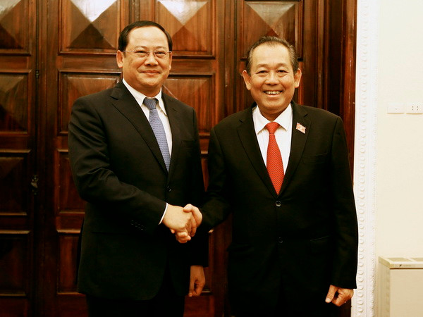 Phó Thủ tướng Trương Hòa Bình hội đàm với Phó Thủ tướng Lào ảnh 1