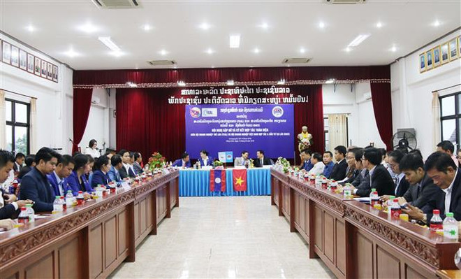 Quang cảnh hội nghị. (Ảnh: Xuân Tú/TTXVN) Các doanh nghiệp Việt Nam tăng cường hợp tác với các doanh nghiệp Lào ảnh 1