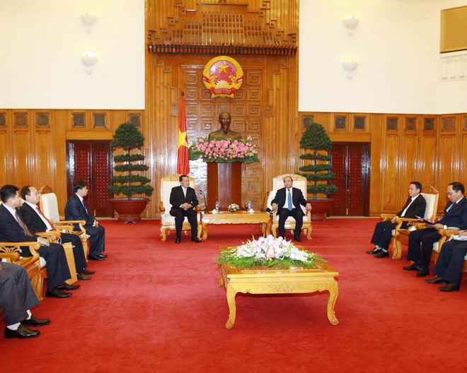 Phó Thủ tướng tiếp Đoàn đại biểu cấp cao Thông tấn xã Pathết Lào ảnh 1